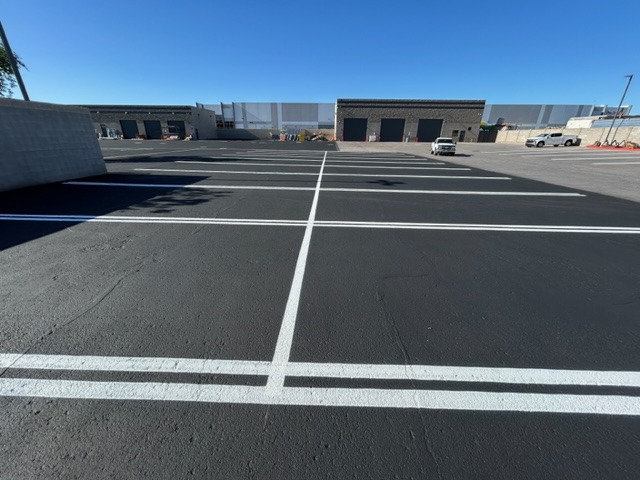 Parking professionals seal coating